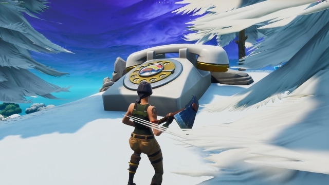 Fortnite Visit an Oversized Phone a Big Piano and a Giant Dancing Fish Trophy