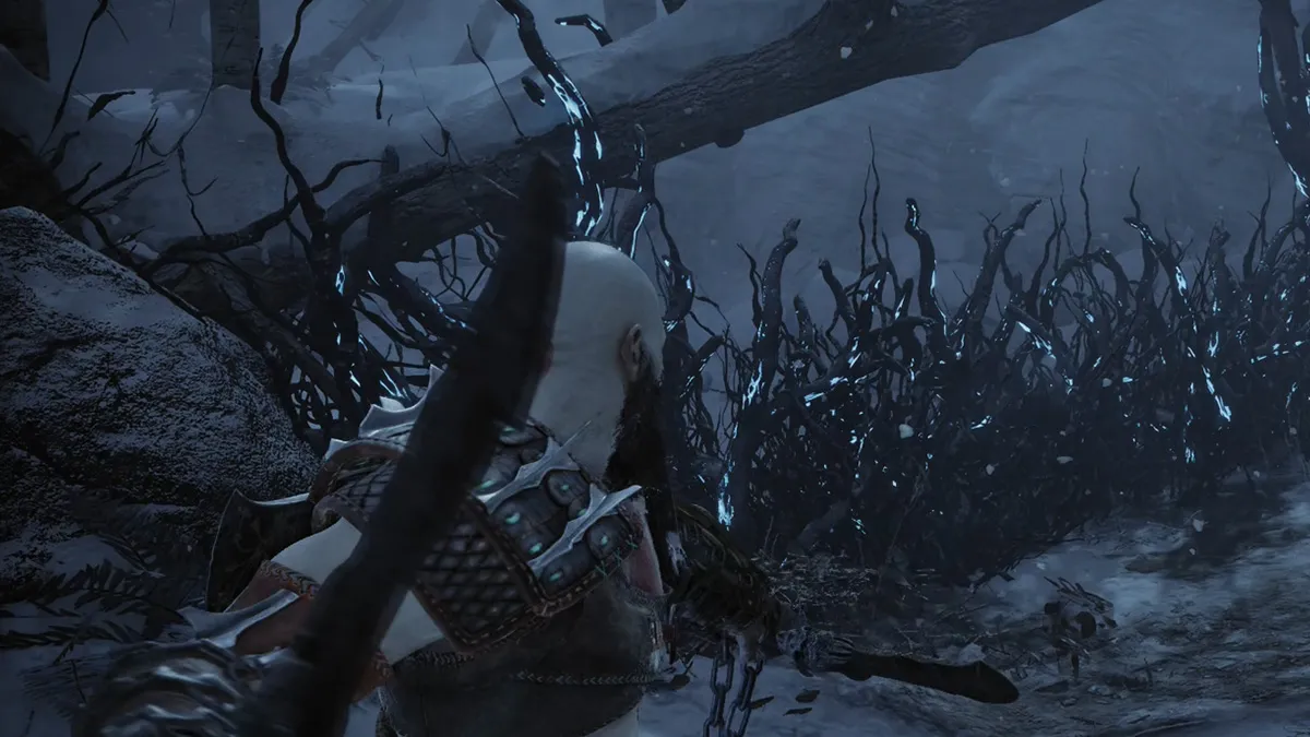 Why does Kratos have blue blades in God of War 2 at the beginning