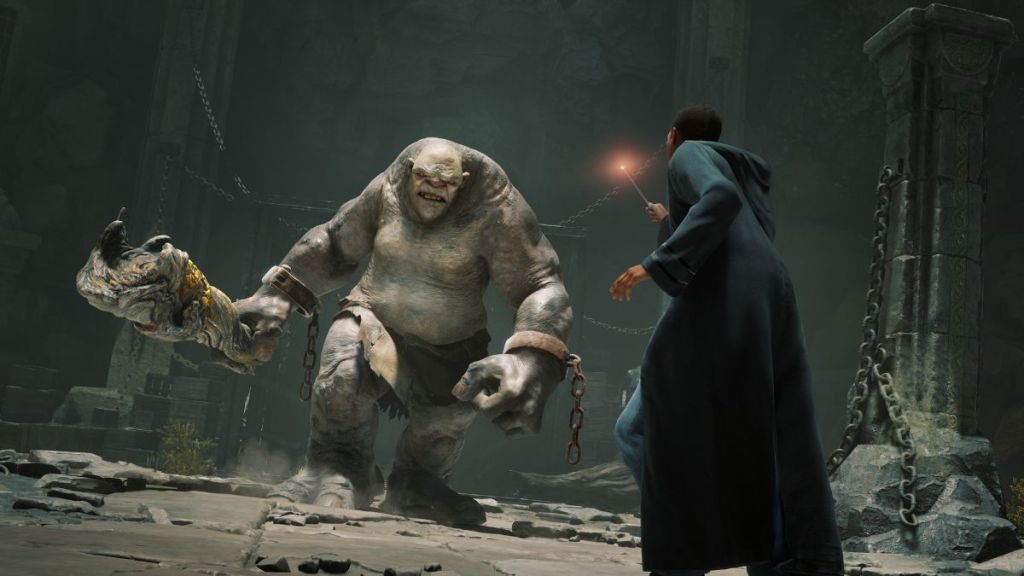 hogwarts legacy screenshot showing wizard facing off against troll