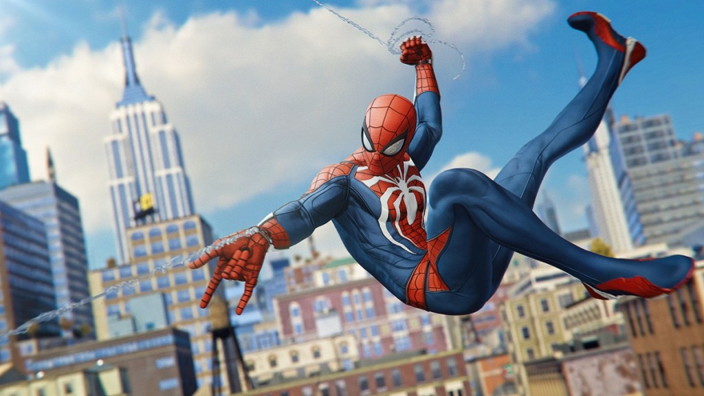 Spider-Man web-slinging through the air with the city in the background.