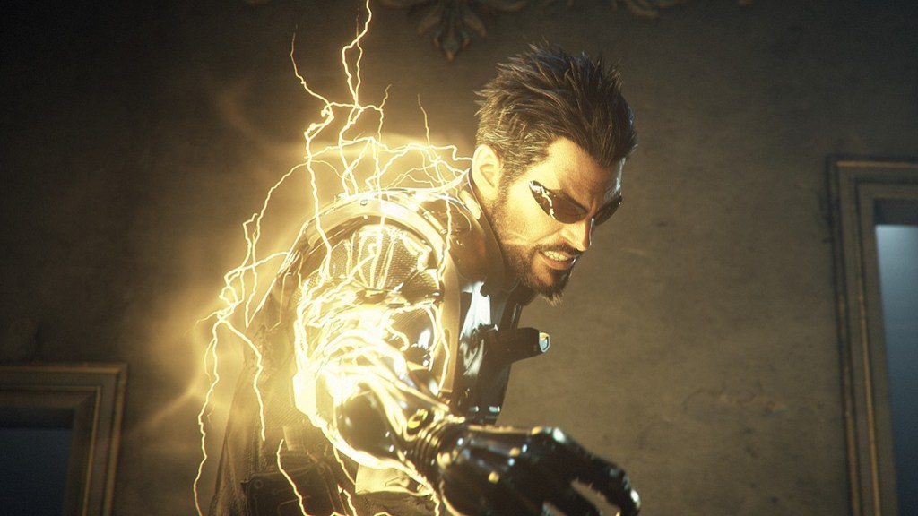 Deus Ex: Adam Jensen with electricity sparking from his arm.