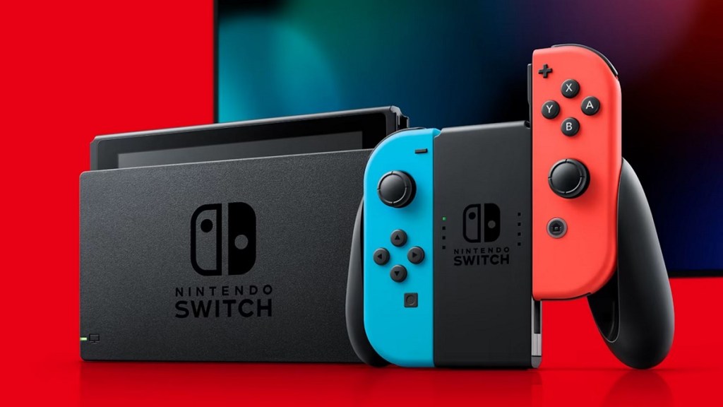 A Nintendo Switch and JoyCon controller with a screen behind it, all on a red background.