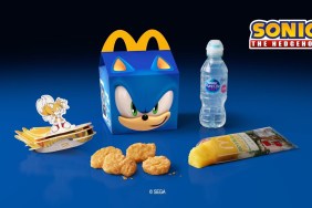 A Sonic the Hedgehog-themed Happy Meal box with McDonald's food placed around it.