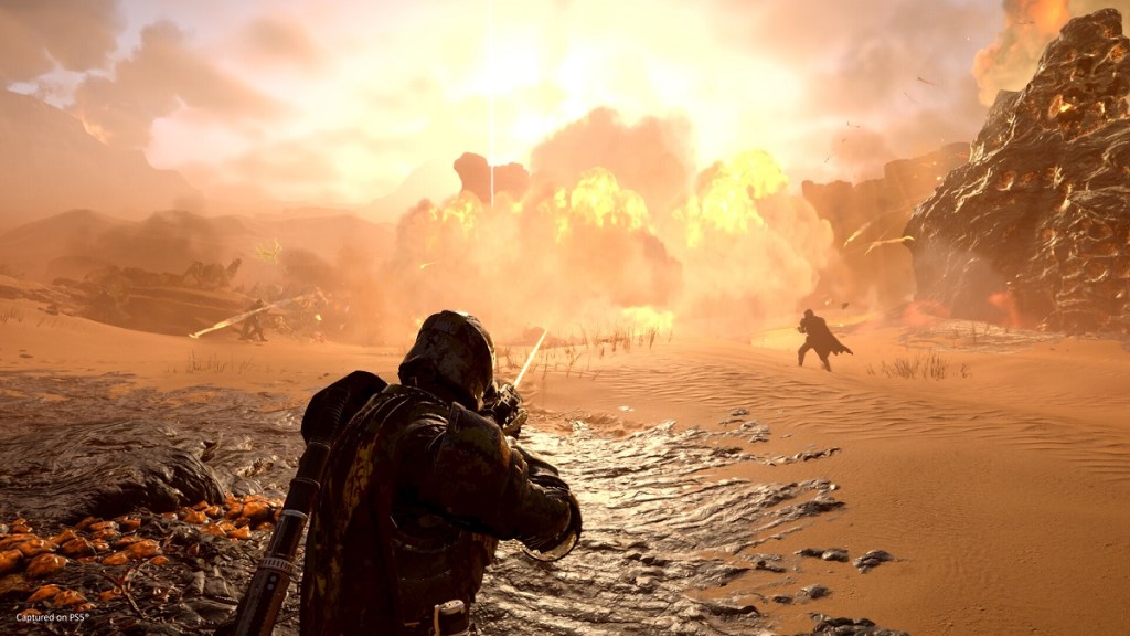 Helldivers 2: soldiers fighting on a brightly lit beach area, with epxlosions in the background.