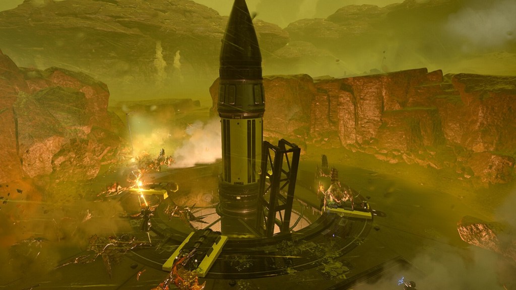 Helldivers 2: a giant rocket in the center of a battle between soldiers and large creatures.